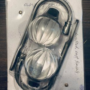 Curtain holdback arms and finial set